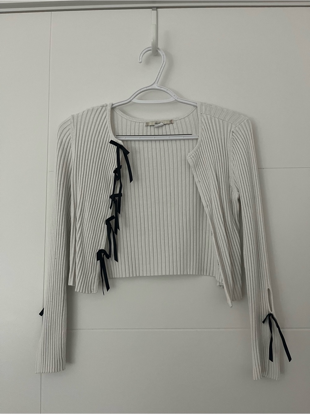Kimchi Blue Ivory Ribbed Cropped Cardigan with Black Ribbon Ties
